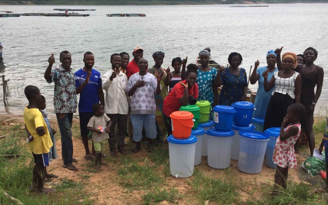 Group of Ghana natives posing for picture with buckets copy